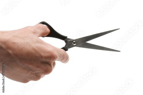 Human hand with scissor isolated on white