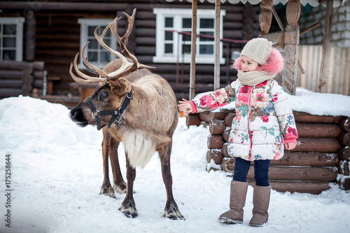 girl reindeer winter