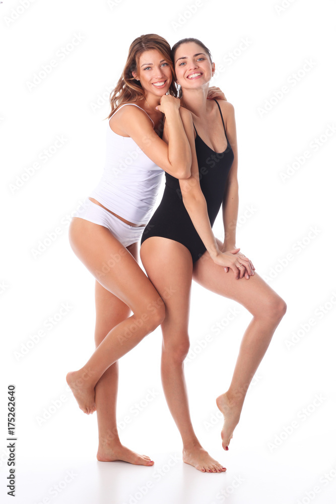 Two beautiful young woman with perfect skin enjoying the moment. Two beautiful young woman with perfect skin enjoying the moment.