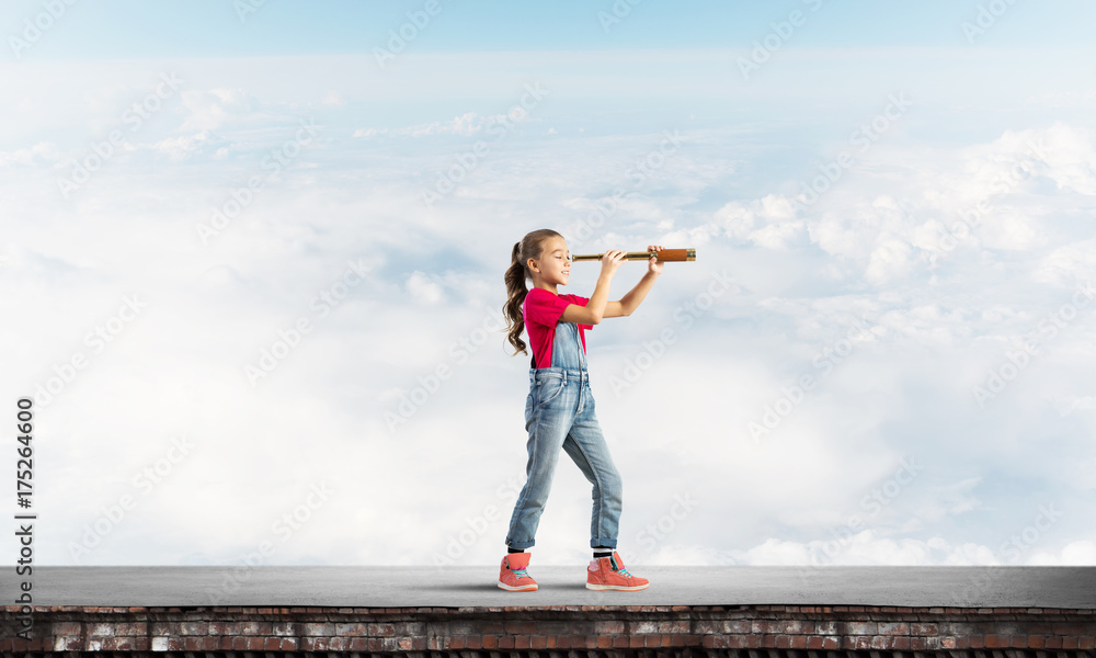 Concept of careless happy childhood with girl exploring this world Concept of careless happy childhood with girl exploring this world