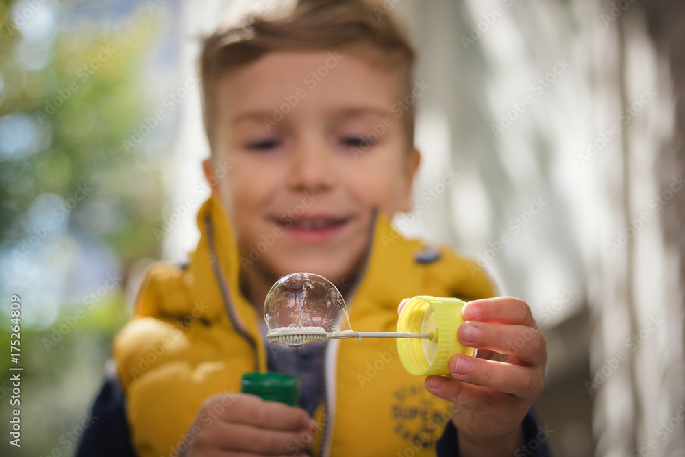 Close up of child blowing bubbles. Close up of child blowing bubbles.