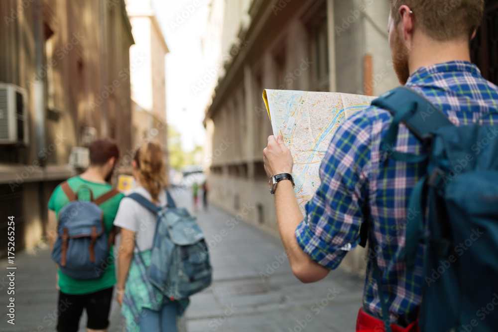 Tourist holding map and sightseeing in city Tourist holding map and sightseeing in city