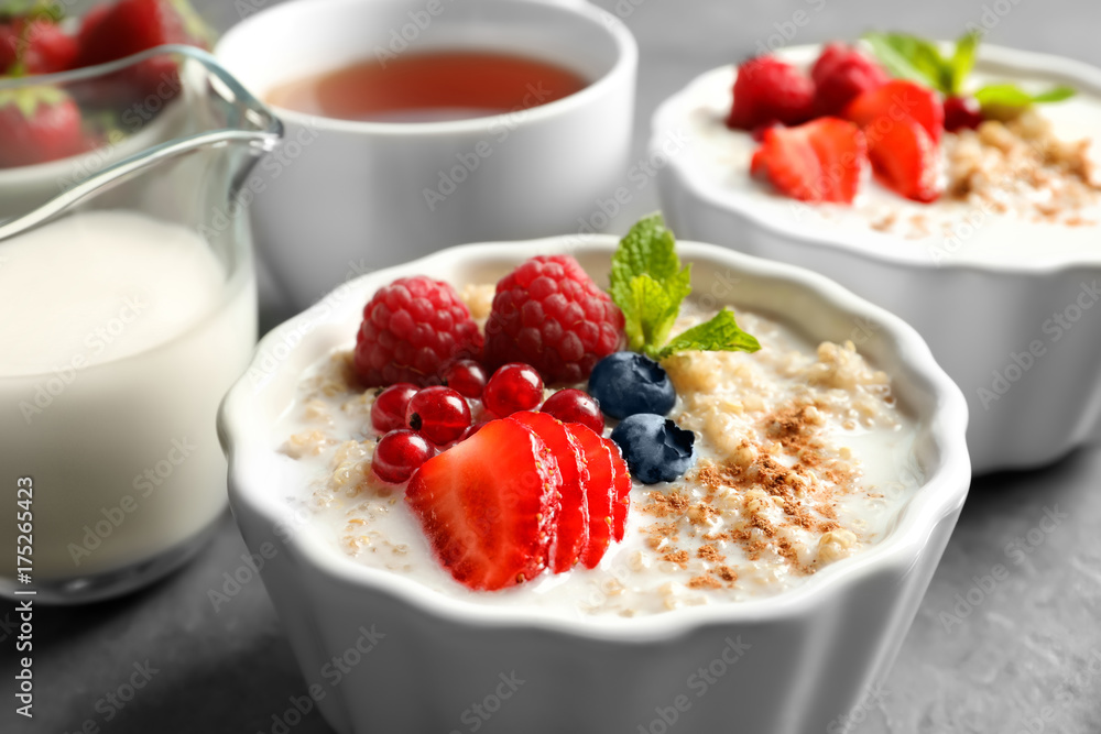 Tasty quinoa with berries in bowl on table Tasty quinoa with berries in bowl on table
