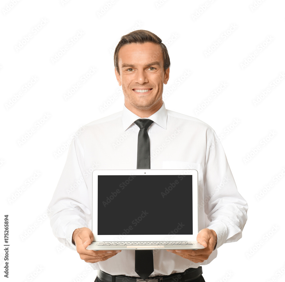Young businessman holding laptop on white background Young businessman holding laptop on white background