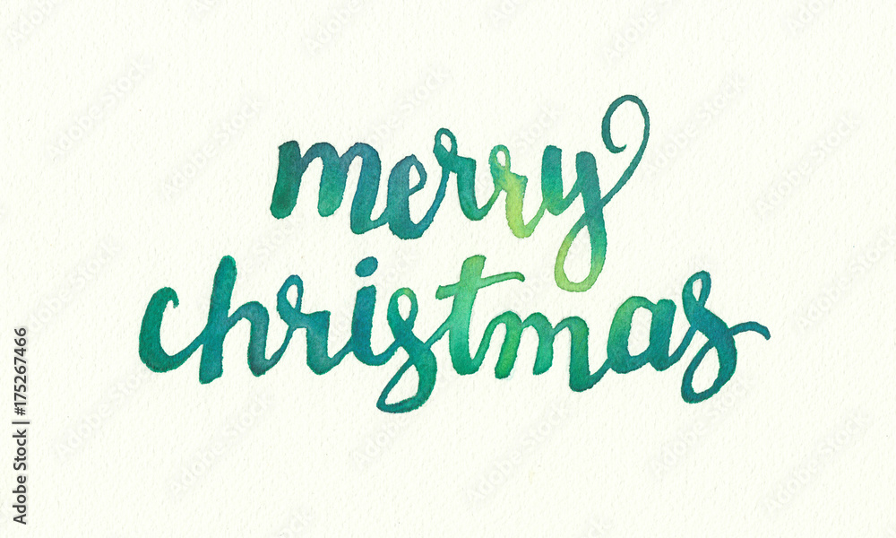 Merry Christmas greeting in hand painted watercolor design, flowing fancy lettering in blue green colors on water color paper texture, festive holiday saying in beautiful handwriting Merry Christmas greeting in hand painted watercolor design, flowing fancy lettering in blue green colors on water color paper texture, festive holiday saying in beautiful handwriting