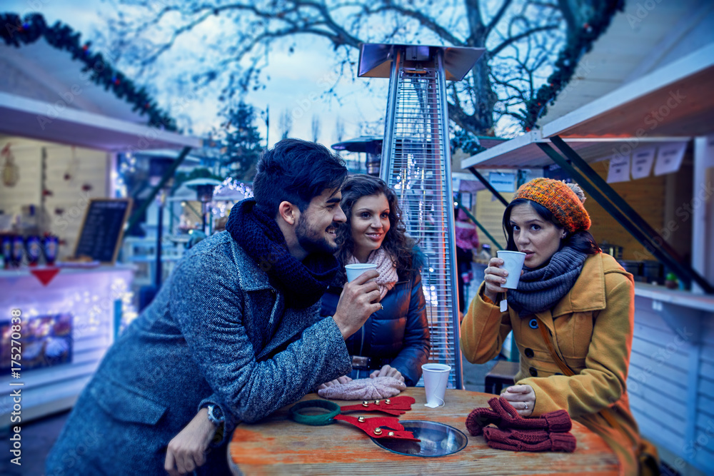 Fototapeta premium Friends On Christmas Market