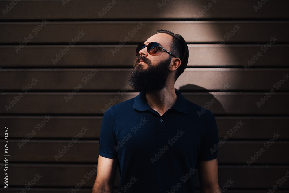 Portrait of a Handsome Bearded Man with a Sunglasses Portrait of a Handsome Bearded Man with a Sunglasses