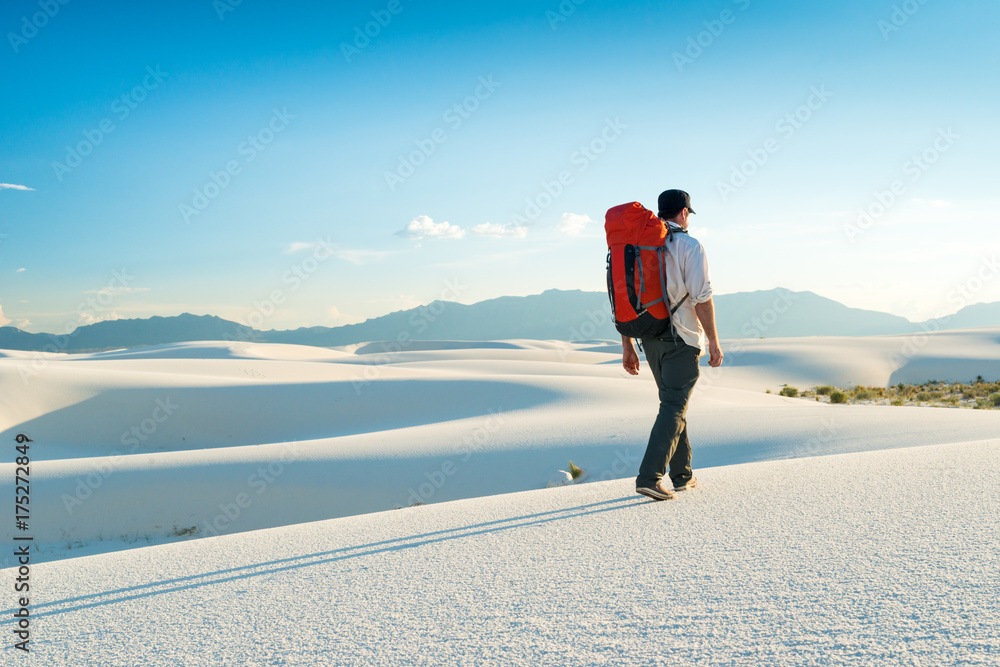 Man Camping in White Sands National Monument Hiking to Back Country Campsite Man Camping in White Sands National Monument Hiking to Back Country Campsite
