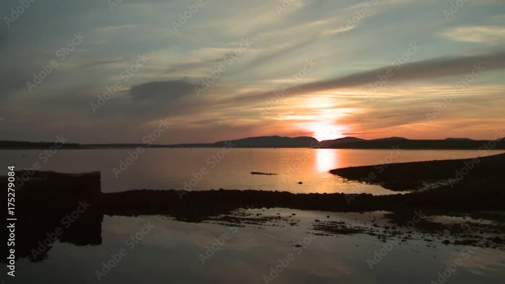 Wide, scenic sunset over mountains in Acadia National Park Wide, scenic sunset over mountains in Acadia National Park