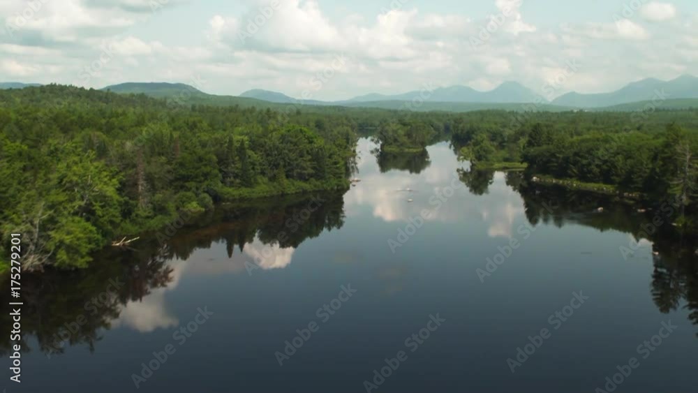 Aerial, calm Penobscot River in Maine forest Aerial, calm Penobscot River in Maine forest