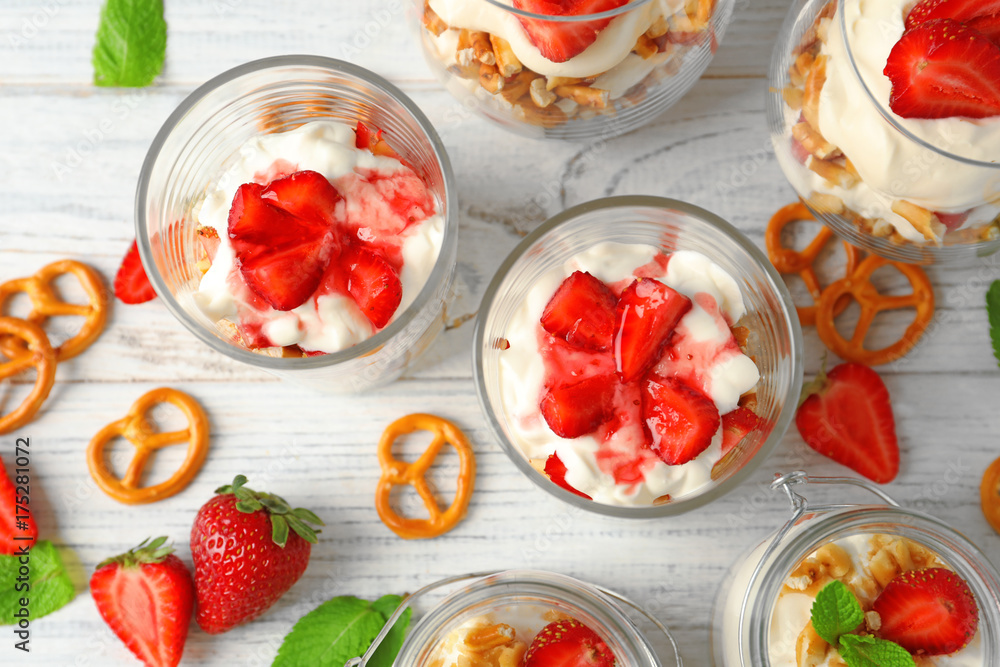 Strawberry pretzel salad in glasses on table Strawberry pretzel salad in glasses on table