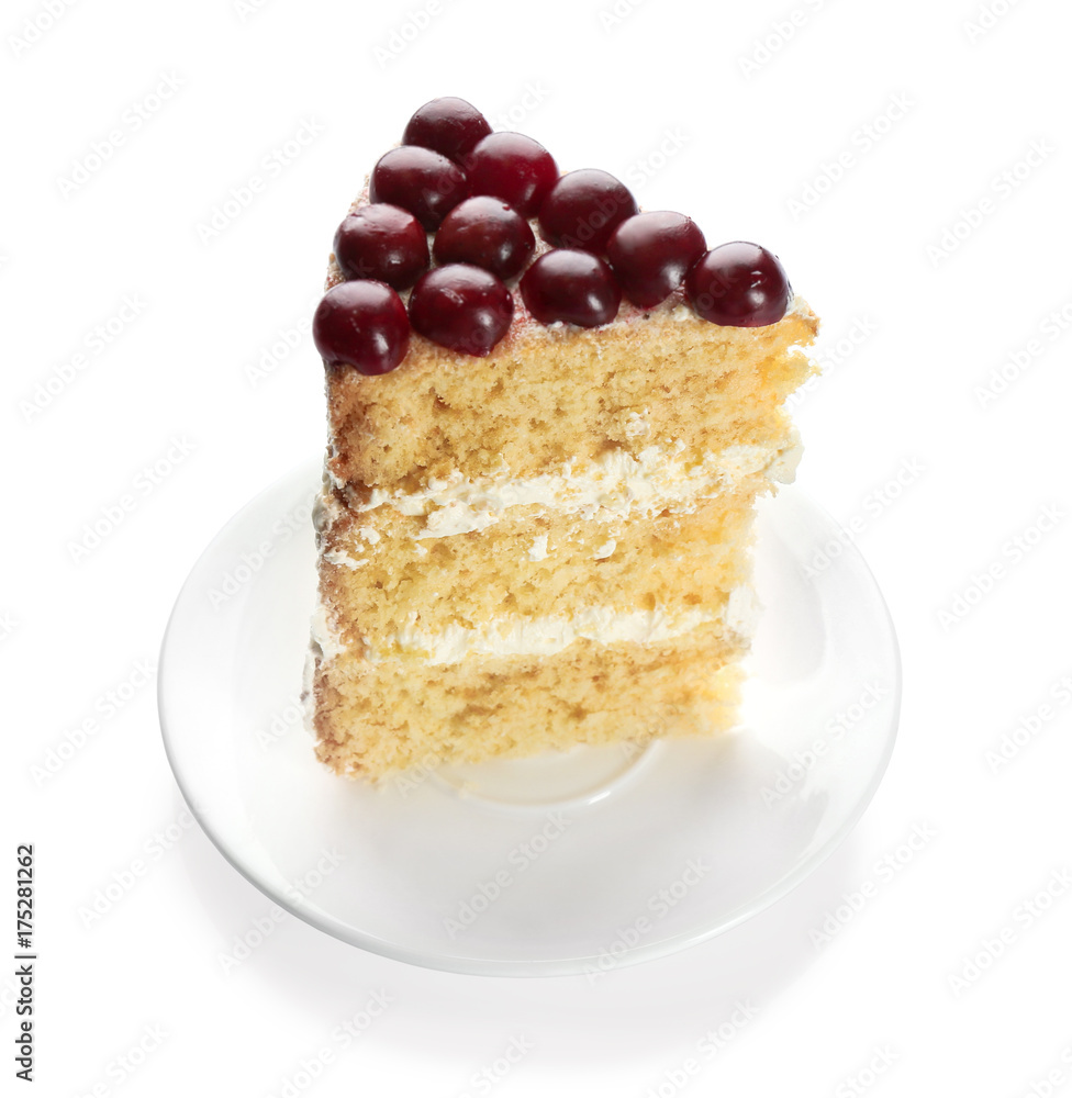 Piece of cake decorated with cherries on white background Piece of cake decorated with cherries on white background