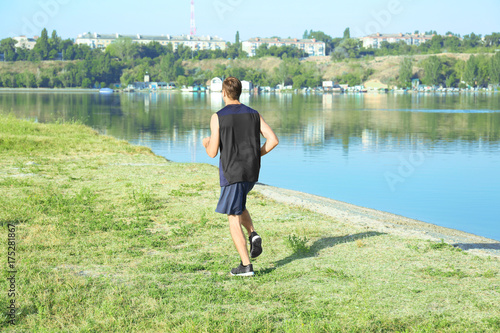 Handsome young man running ...