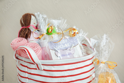 Baby shower gifts against c...