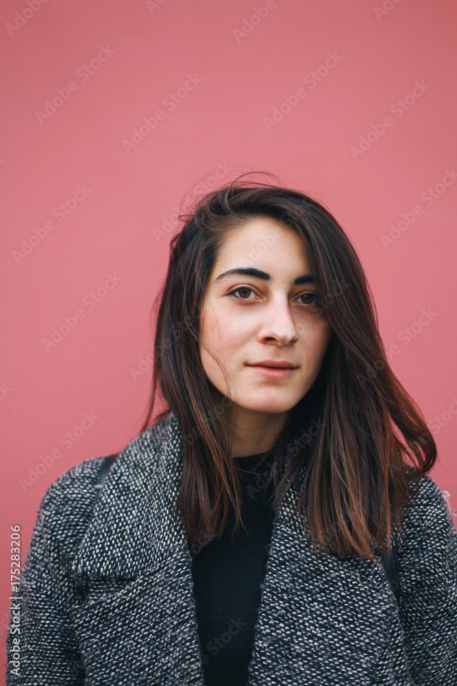 Beautiful young woman looking at camera Beautiful young woman looking at camera