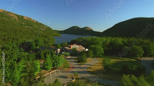 House on edge of Jordan Pond on film, aerial