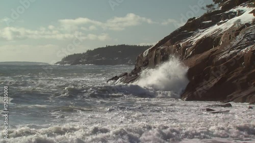Waves crash on Sand Beach in winter, Maine