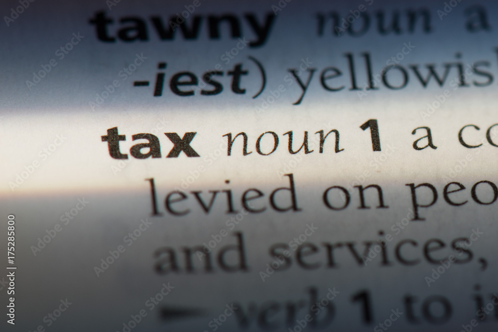 Tax word in a dictionary. Tax concept Tax word in a dictionary. Tax concept