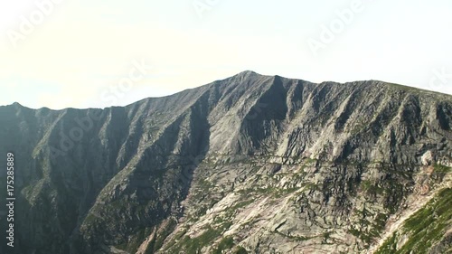 Flyover aerial, peak of Mount Katahdin in Maine