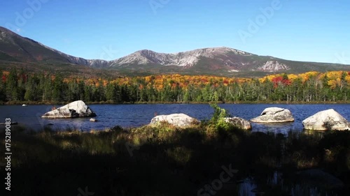 Wide, Mount Katahdin towers over autumn forest