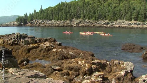 People kayak in Acadia National Park lake