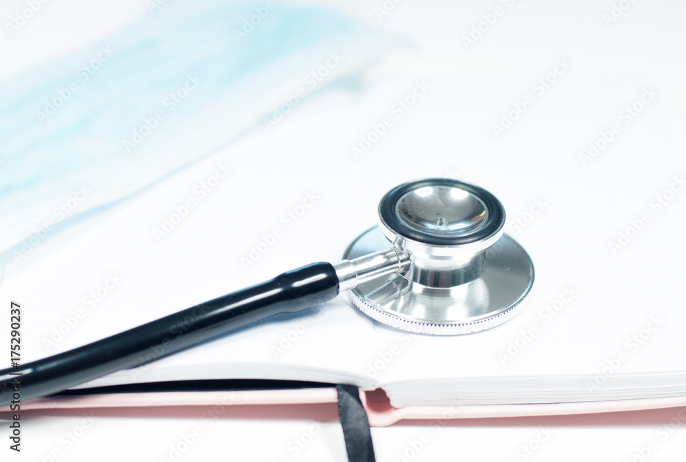 Medical stethoscope. Doctor table with medical items Medical stethoscope. Doctor table with medical items