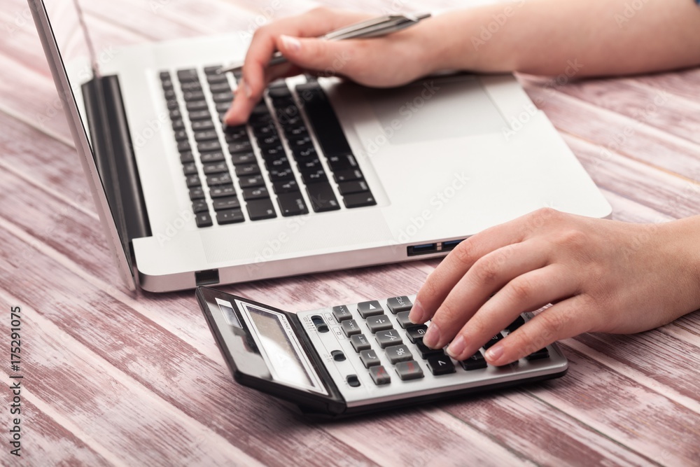 Businessman's hands with calculator. Businessman's hands with calculator.