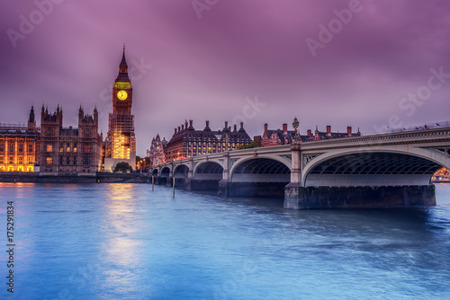London  the United Kingdom  the Palace of Westminster with Big Ben  Elizabeth Tower  viewed from across the River Thames at night