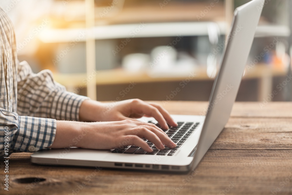Fototapeta premium Woman typing computer.