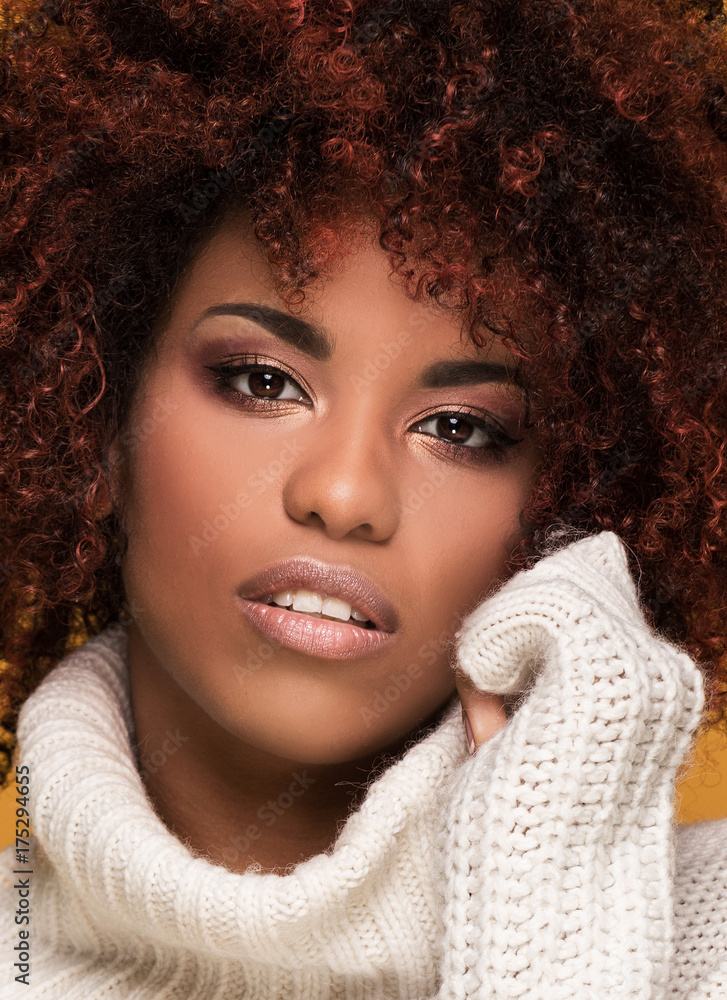 Portrait of beautiful woman with afro hairstyle. Portrait of beautiful woman with afro hairstyle.
