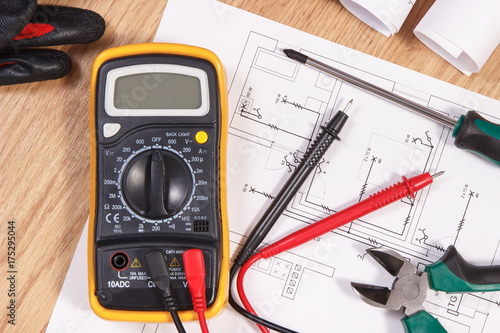 Electrical diagrams, multimeter for measurement in electrical installation and accessories for use in engineer jobs