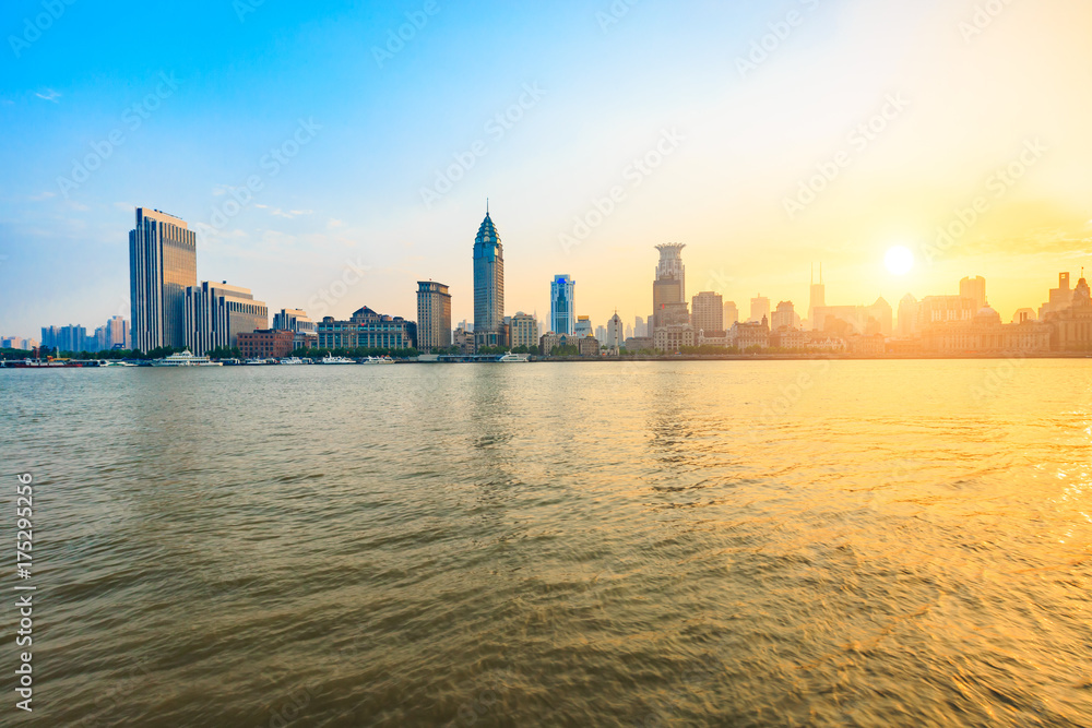 Huangpu River and modern city scenery in Shanghai at sunset
