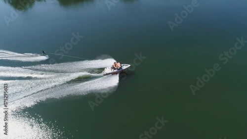 Aerial shooting wake surfing on the river
