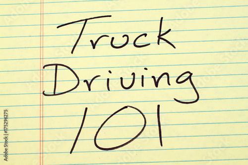 The words "Truck Driving 101" on a yellow legal pad