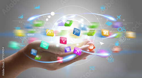 Application icons interface on hand. Social media concept