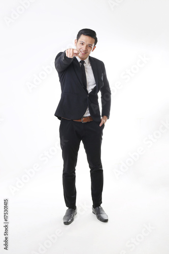 Portrait of Asian Man in Isolated Background With Gesture Sign