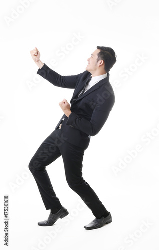 Portrait of Asian Man in Isolated Background With Gesture Sign