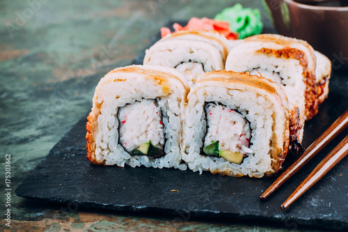 Eel fish sushi roll maki - japanese food - selective focus