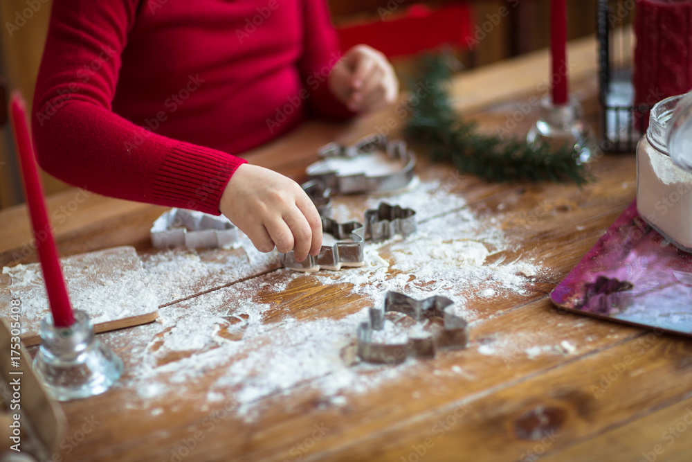 funny child girl preparing cookies, lifestyle, real nordic interior, rustic style, the brown funny child girl preparing cookies, lifestyle, real nordic interior, rustic style, the brown