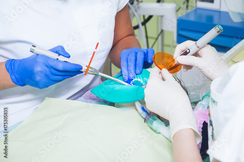 Close-up of a dentist treat  teeth