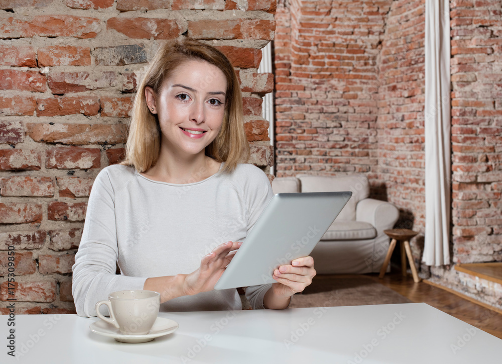Girl with digital tablet and coffee Girl with digital tablet and coffee