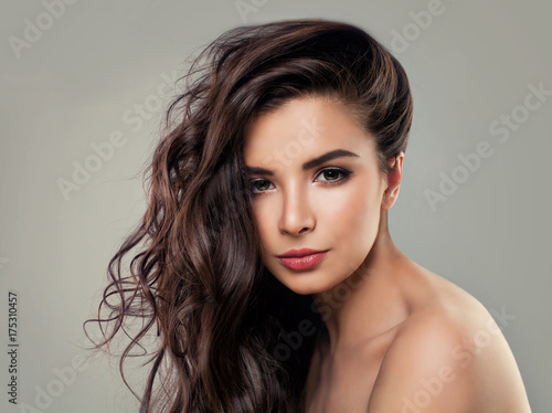 Portrait of Sensual Woman Fashion Model with Natural Wavy Hair