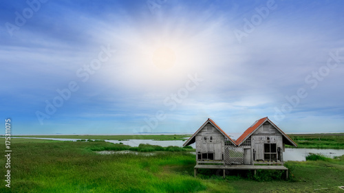 Twin old house is abandons on wetland at Talay Noi lake at Phatthalung,southern of Thailand.