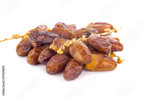 dried fruits from date palm isolated on white background