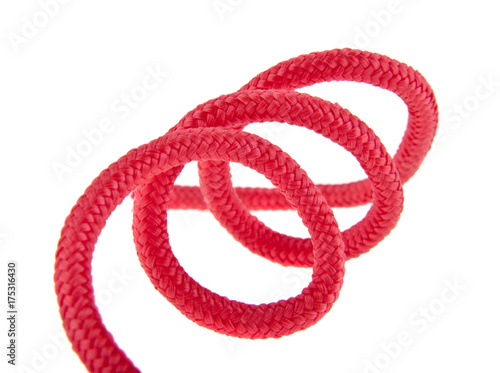 Red rope isolated on white background close-up