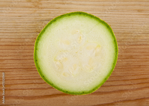 zucchini on a wooden background closeup