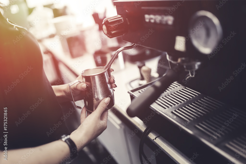 Barista making fresh coffee with machine Barista making fresh coffee with machine