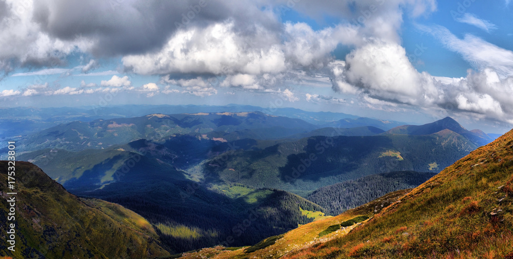 Fototapeta premium Carpathian mountains autumn landscape with blue sky and clouds,