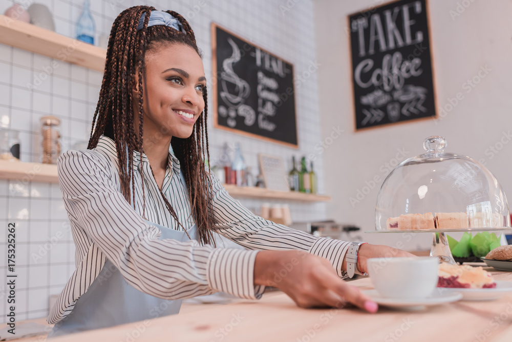 barista serving order to client barista serving order to client