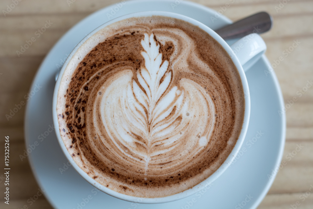 Hot chocolate with cream in the shape of a leaf Hot chocolate with cream in the shape of a leaf
